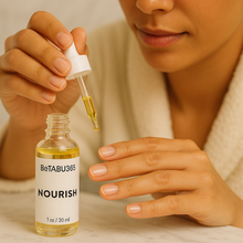 Load image into Gallery viewer, BeTABU365 nail wash and cuticle oil bottles displayed side by side.
BeTABU365 Cleanse nail wash and Nourish cuticle oil arranged together.
Close-up of the BeTABU365 nail care duo bottles.
BeTABU365 nail wash and cuticle oil set shown in a product display.