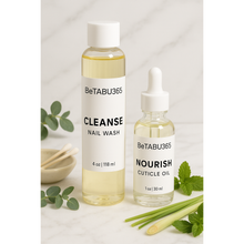 Load image into Gallery viewer, BeTABU365 nail wash and cuticle oil bottles displayed side by side.
BeTABU365 Cleanse nail wash and Nourish cuticle oil arranged together.
Close-up of the BeTABU365 nail care duo bottles.
BeTABU365 nail wash and cuticle oil set shown in a product display.

